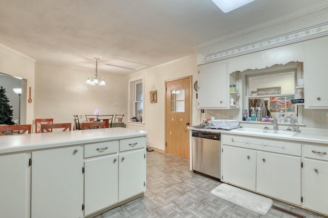 kitchen featuring white cabinets, pendant lighting, light parquet flooring, and stainless steel dishwasher