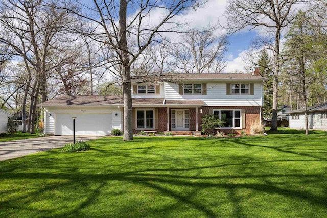 view of front facade featuring a front yard and a garage