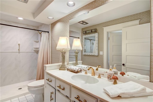 bathroom featuring tile patterned flooring, vanity, toilet, and walk in shower