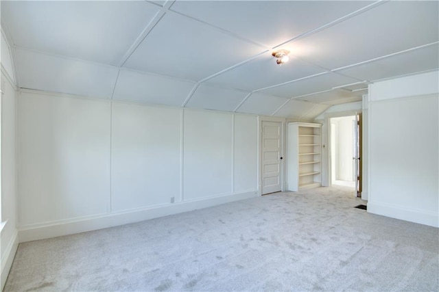 spare room with light carpet