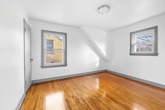 bonus room featuring hardwood / wood-style floors