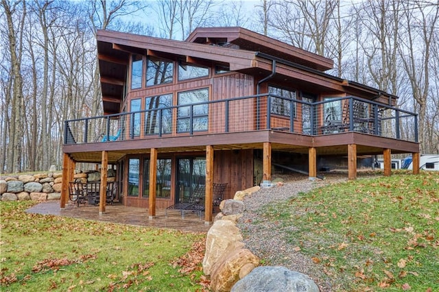 back of house featuring a patio area