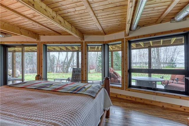 unfurnished bedroom featuring multiple windows, dark hardwood / wood-style flooring, beamed ceiling, and wooden ceiling