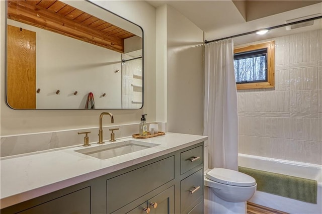 full bathroom featuring shower / bath combination with curtain, vanity, toilet, and wooden ceiling