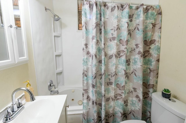 full bathroom with shower / tub combo, toilet, and sink