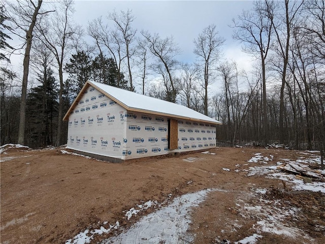 view of snow covered garage