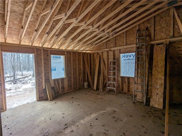 misc room with lofted ceiling