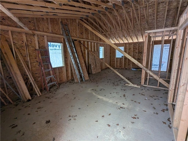 unfinished attic featuring a wealth of natural light