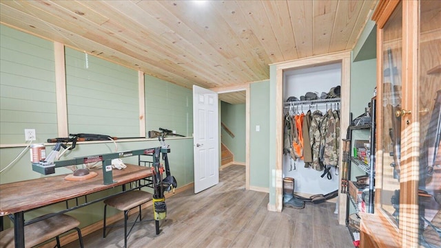 interior space featuring hardwood / wood-style floors and wooden ceiling