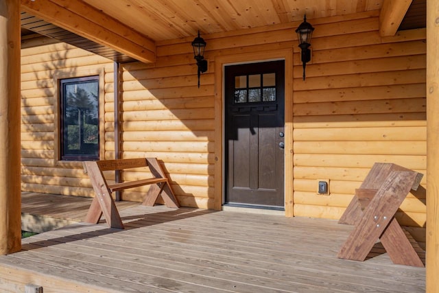 entrance to property featuring a deck