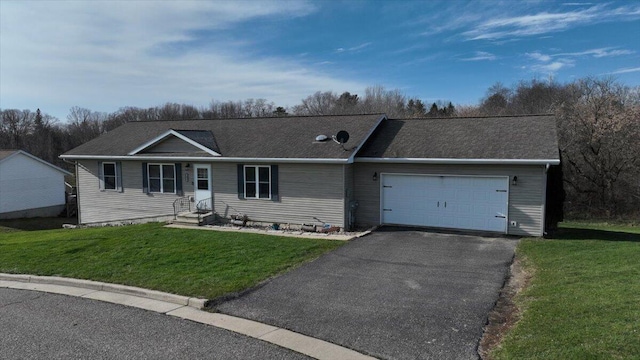 single story home featuring a front yard and a garage