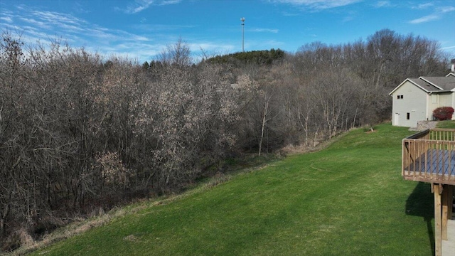 view of yard with a wooden deck