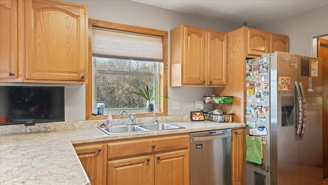 kitchen with sink and stainless steel appliances