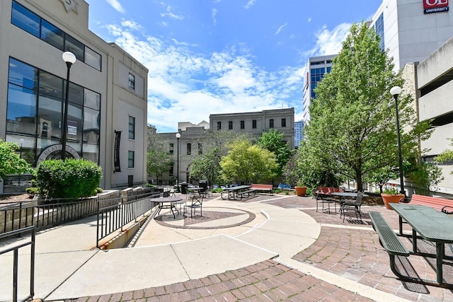 view of home's community with a patio area