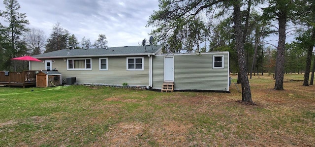 N9128 Snow Snake Trl, Necedah, WI 54646 - rear view of property featuring entry steps, a yard, a deck, and a storage shed