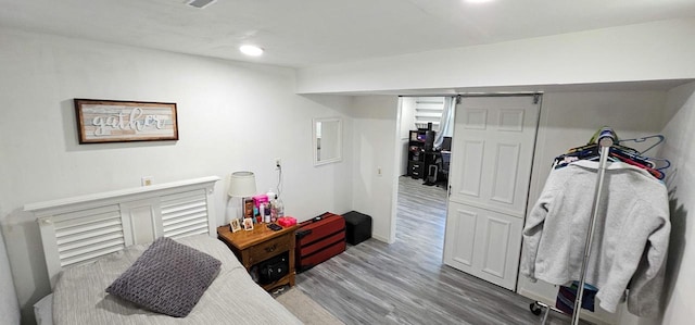 bedroom featuring wood-type flooring