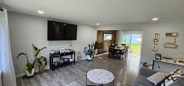 living room with dark hardwood / wood-style floors