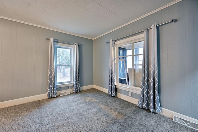 carpeted empty room with ornamental molding