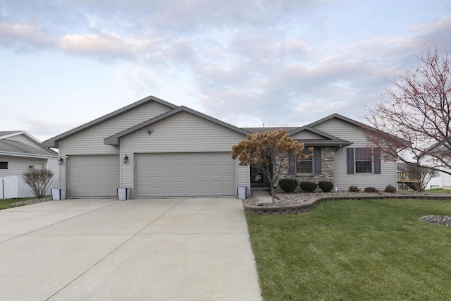 ranch-style house with a garage and a front lawn