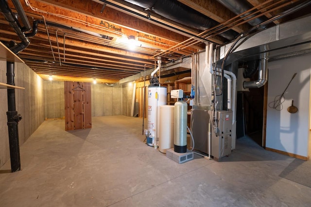 basement with water heater and heating unit