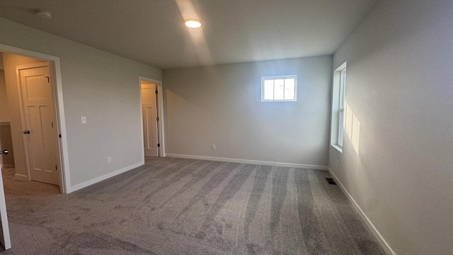 view of carpeted spare room