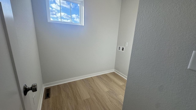 empty room with light wood-type flooring