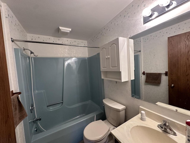 full bathroom with vanity, toilet, and shower / washtub combination