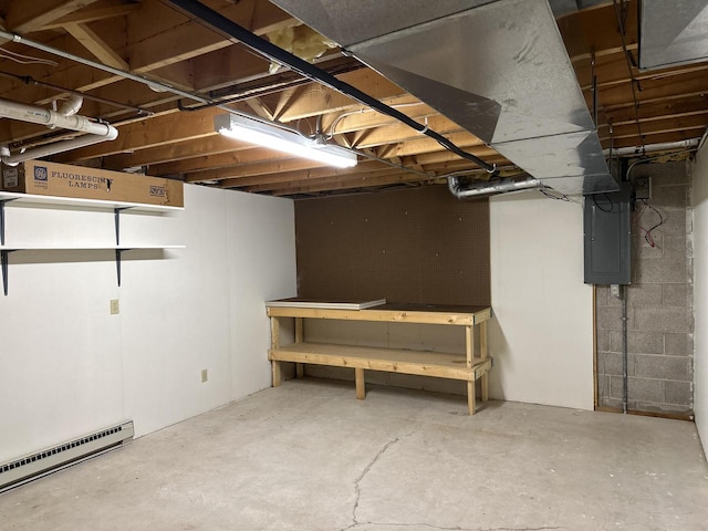 basement with electric panel and a baseboard radiator