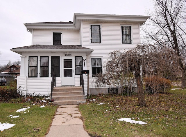 view of front of home featuring a front lawn