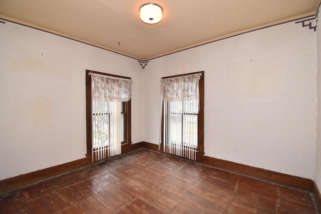 empty room featuring dark hardwood / wood-style floors