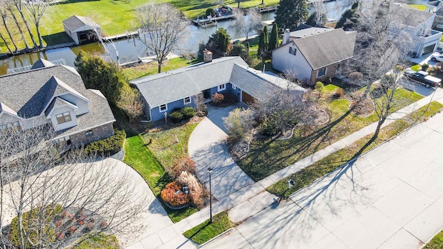 birds eye view of property featuring a water view