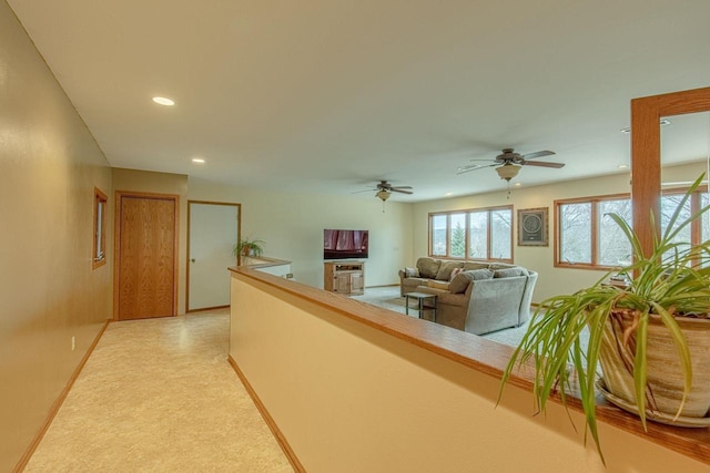 living room with ceiling fan