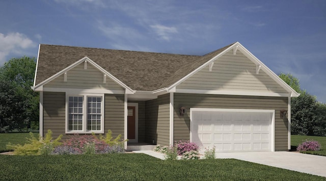 view of front of property featuring a front lawn and a garage