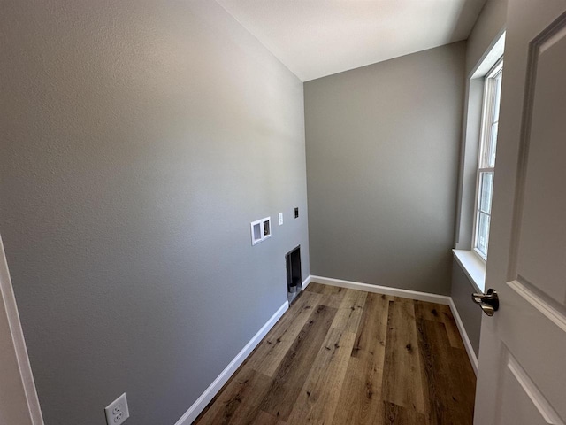 laundry room with hardwood / wood-style floors, washer hookup, and hookup for an electric dryer