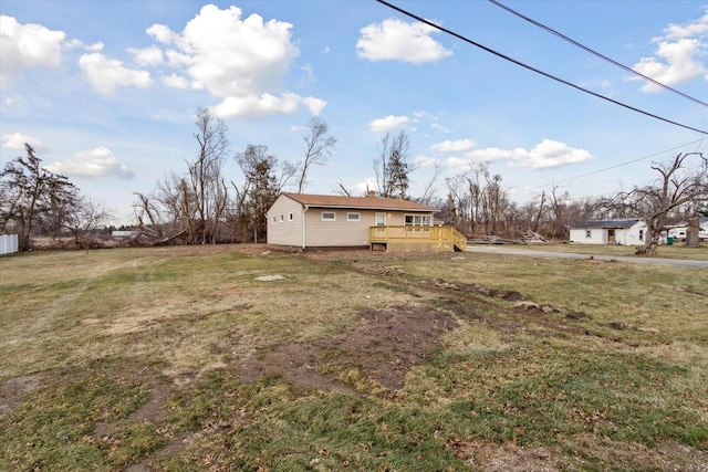 view of yard with a wooden deck