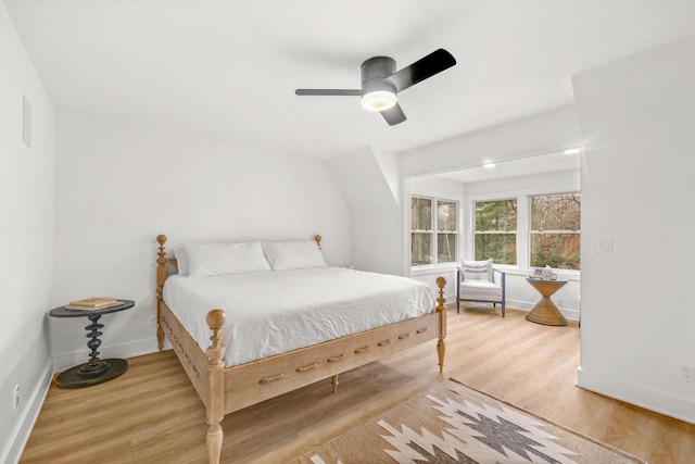 bedroom with light wood-type flooring and ceiling fan