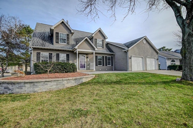 cape cod home with a front yard and a garage