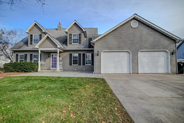 view of front facade with a garage and a front lawn