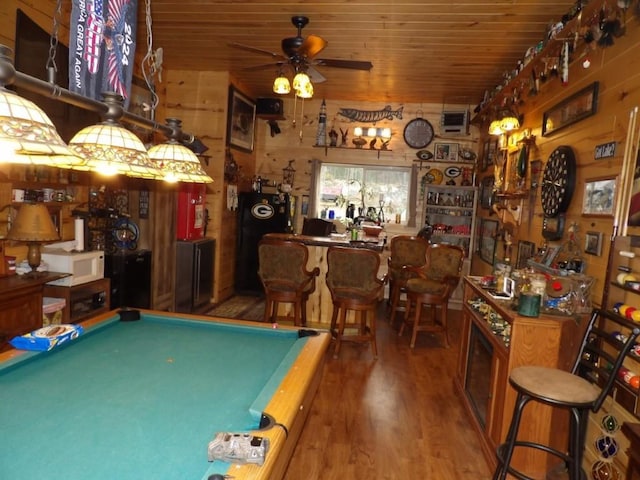 playroom featuring ceiling fan, indoor bar, wooden ceiling, hardwood / wood-style floors, and pool table