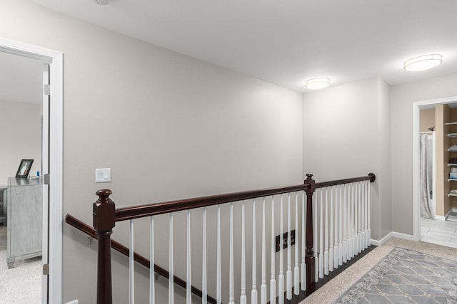 9907 White Fox Ln, Middleton, WI 53562 - hallway with an upstairs landing and carpet flooring