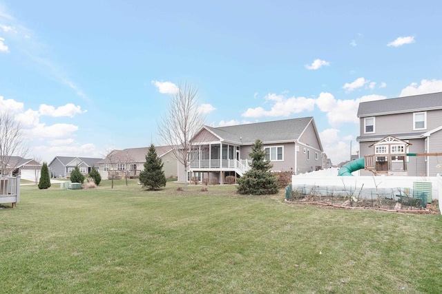 9907 White Fox Ln, Middleton, WI 53562 - rear view of house featuring a sunroom and a residential view