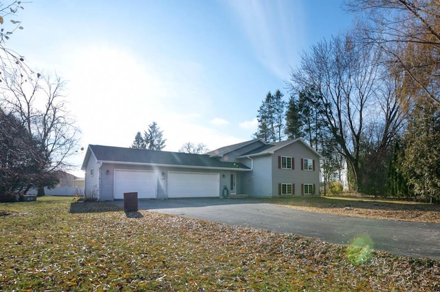 split level home with a garage