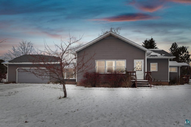 view of front of home with a garage