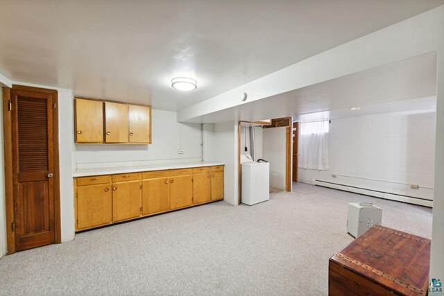 121 E Bayfield St, Washburn, WI 54891 - kitchen featuring light colored carpet, washer / clothes dryer, and a baseboard heating unit