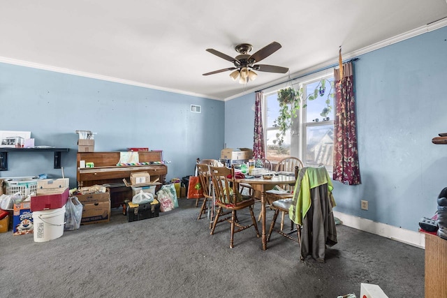 dining room with carpet, ceiling fan, and ornamental molding