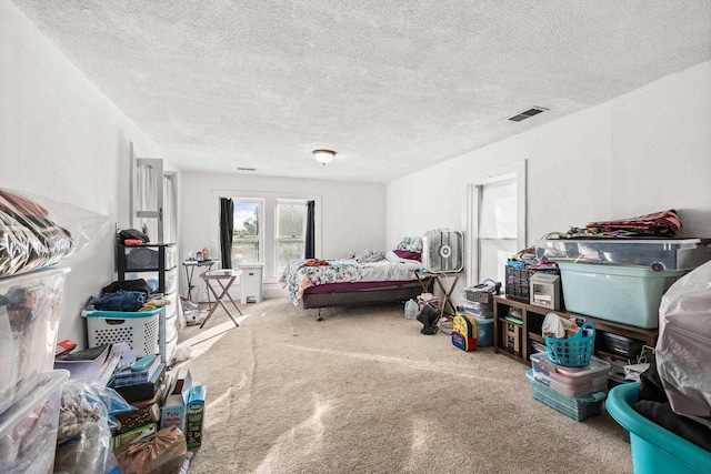 bedroom featuring a textured ceiling