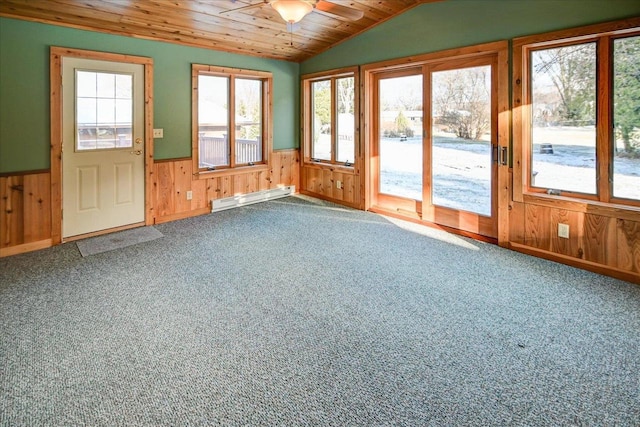 unfurnished sunroom with baseboard heating, ceiling fan, wood ceiling, and vaulted ceiling