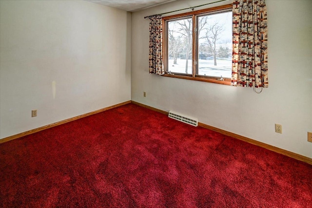 view of carpeted spare room