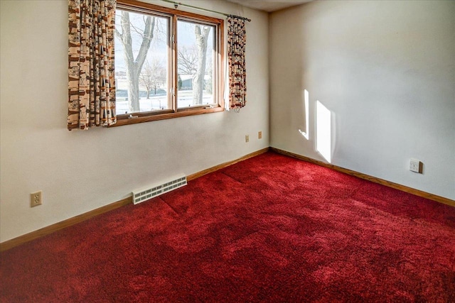 view of carpeted spare room