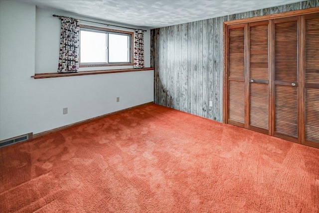 unfurnished bedroom with carpet